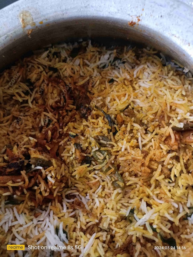 Delicious Veg Biryani prepared by COOX