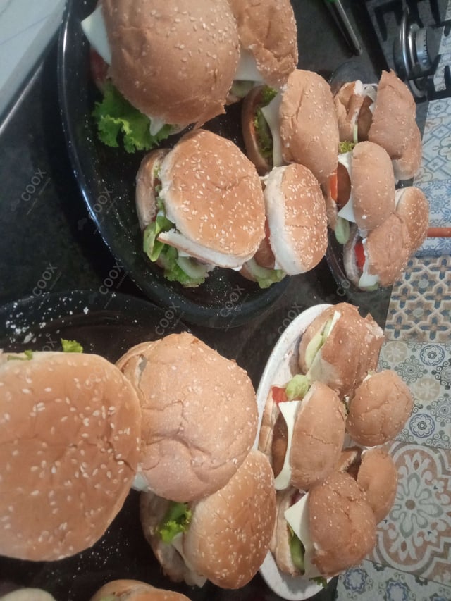 Delicious Mini Veg Burgers prepared by COOX