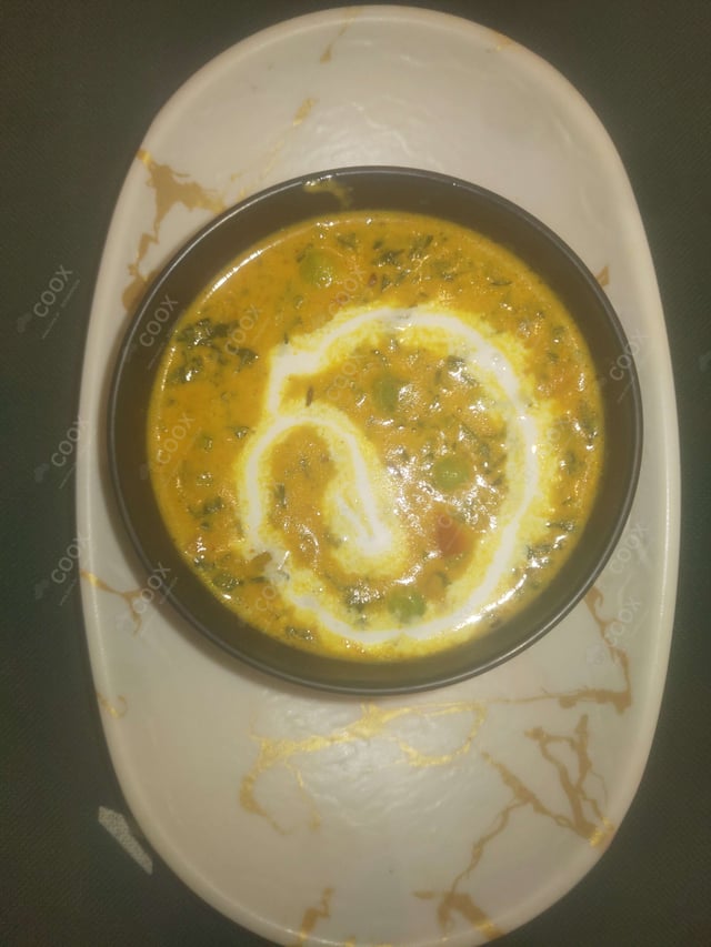 Delicious Methi Matar Malai prepared by COOX