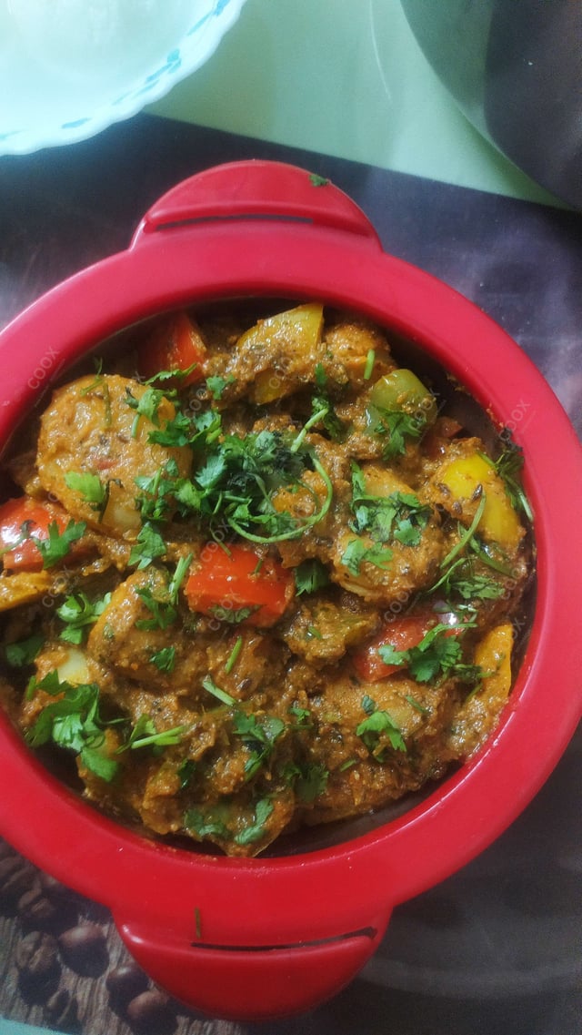 Delicious Dum Aloo prepared by COOX