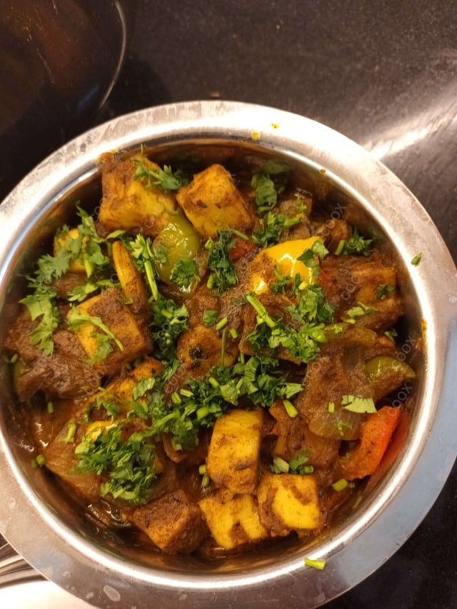 Delicious Kadhai Paneer prepared by COOX