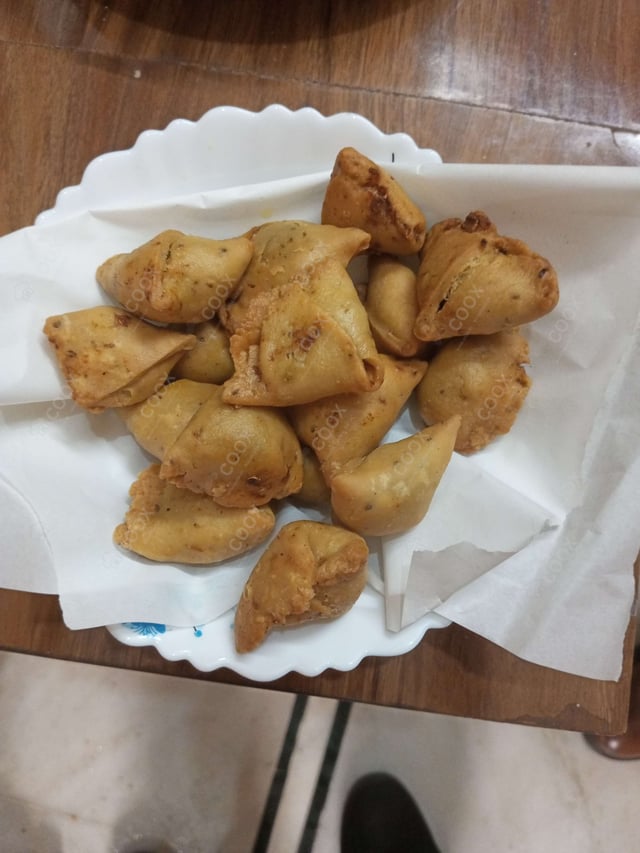 Delicious Mini Samosas prepared by COOX