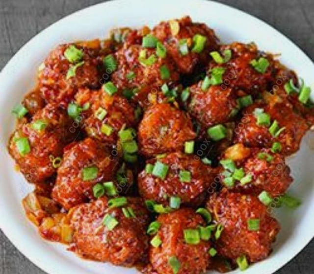 Delicious Veg Manchurian (Dry) prepared by COOX