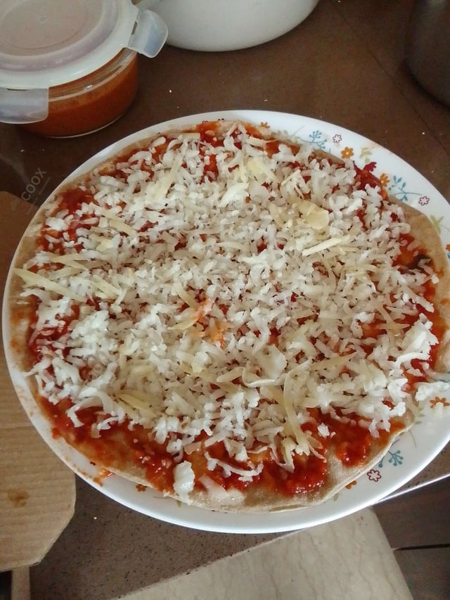 Delicious Margherita Pizza prepared by COOX