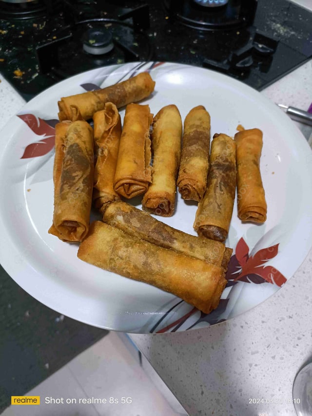 Delicious Veg Spring Rolls prepared by COOX