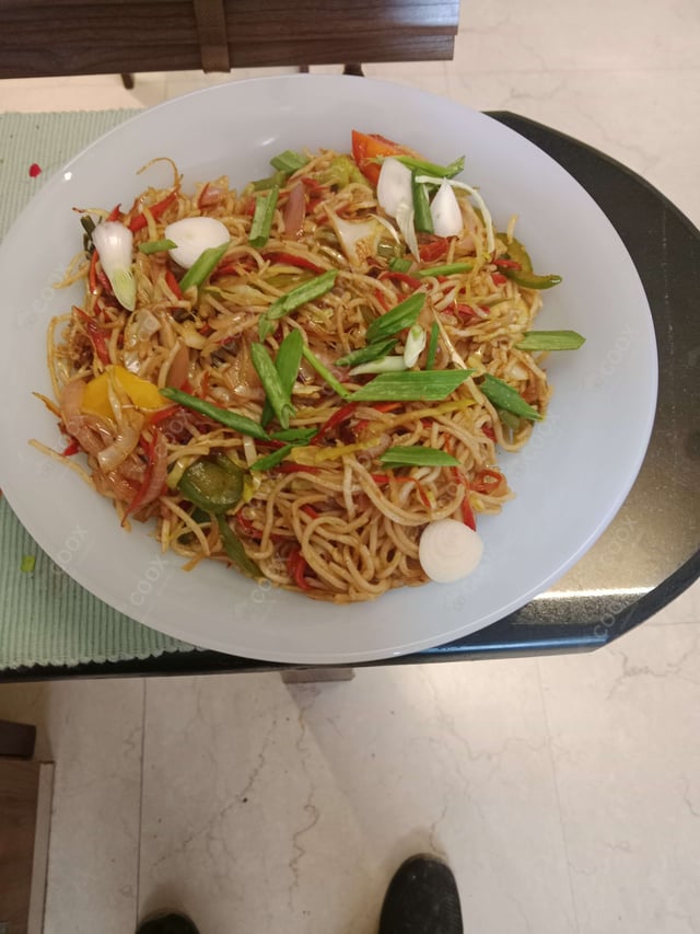 Delicious Veg Hakka Noodles prepared by COOX