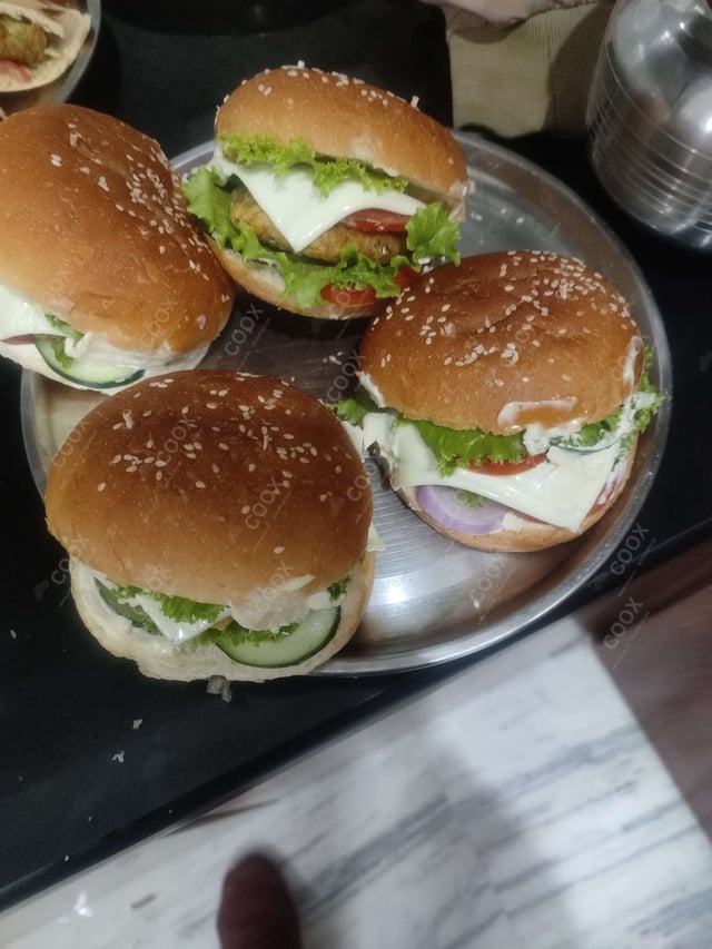 Delicious Mini Veg Burgers prepared by COOX