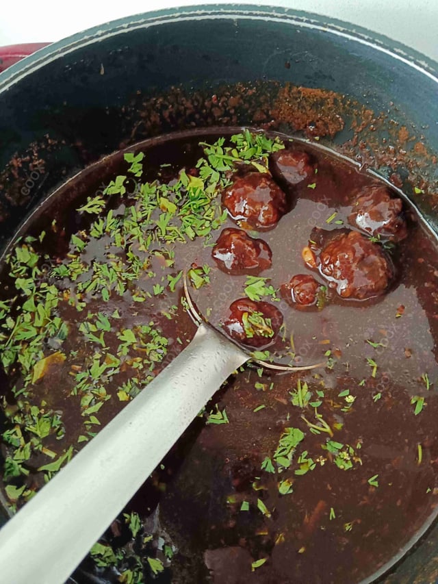 Delicious Veg Manchurian (Gravy) prepared by COOX