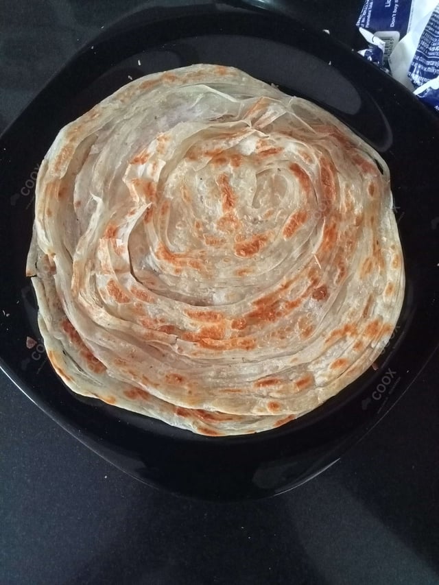 Delicious Malabar Parotta prepared by COOX