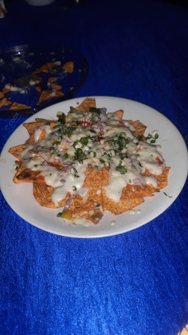 Delicious Cheese Nachos prepared by COOX