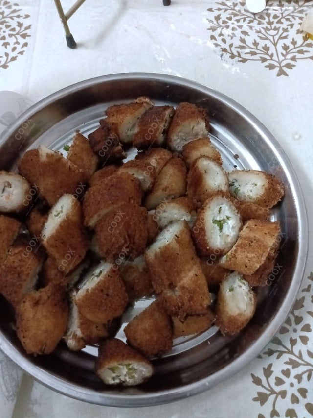 Delicious Dahi ke Sholey prepared by COOX