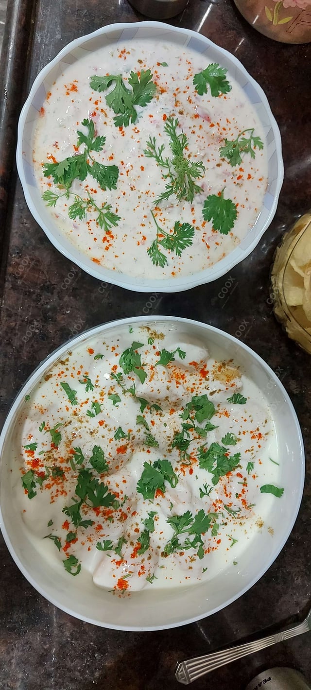 Delicious Dahi Bhalla prepared by COOX