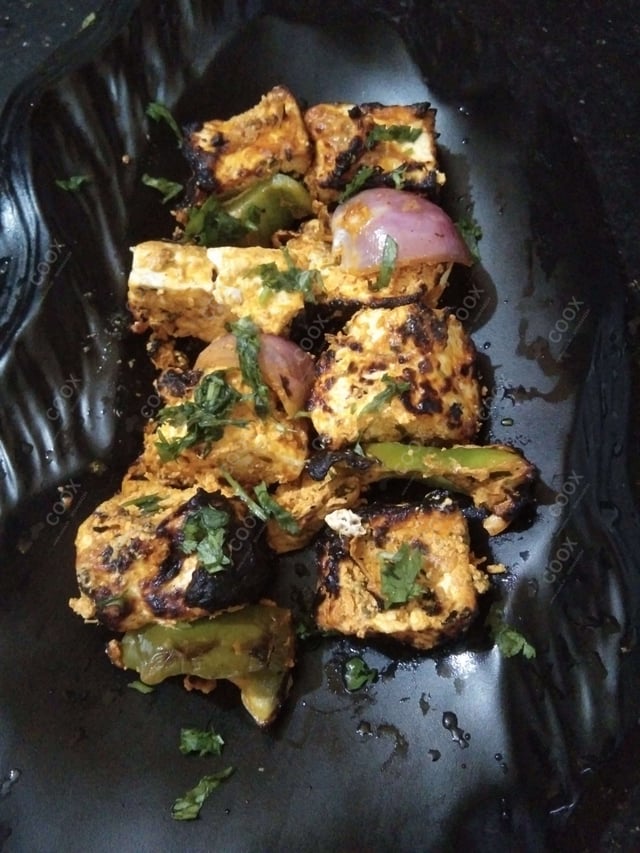 Delicious Paneer Tikka prepared by COOX