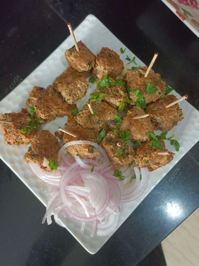 Delicious Mutton Seekh Kebab prepared by COOX