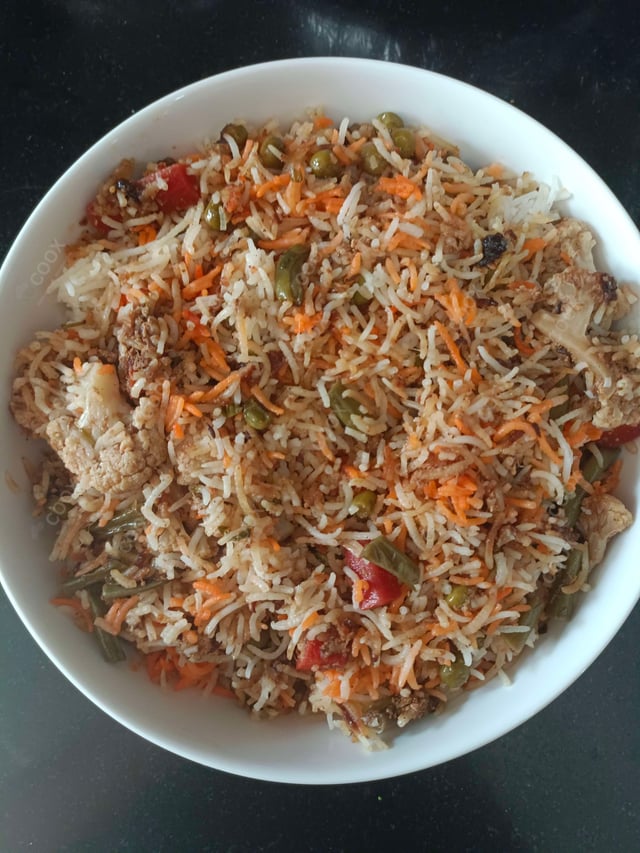 Delicious Veg Biryani prepared by COOX