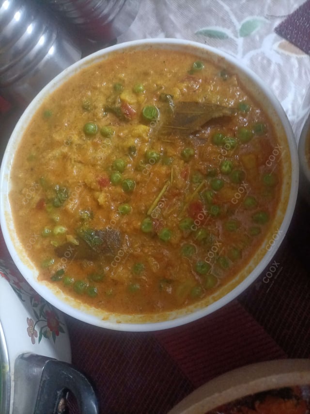 Delicious Gobhi Matar prepared by COOX