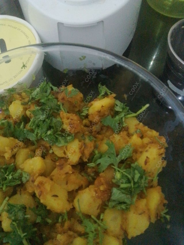 Delicious Jeera Aloo prepared by COOX