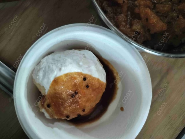 Delicious Dahi Bhalla prepared by COOX