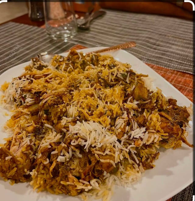 Delicious Chicken Biryani prepared by COOX