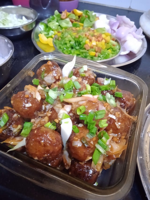 Delicious Veg Manchurian (Dry) prepared by COOX