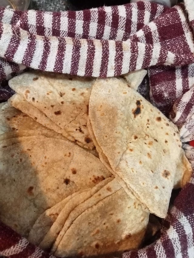 Delicious Tawa Rotis prepared by COOX