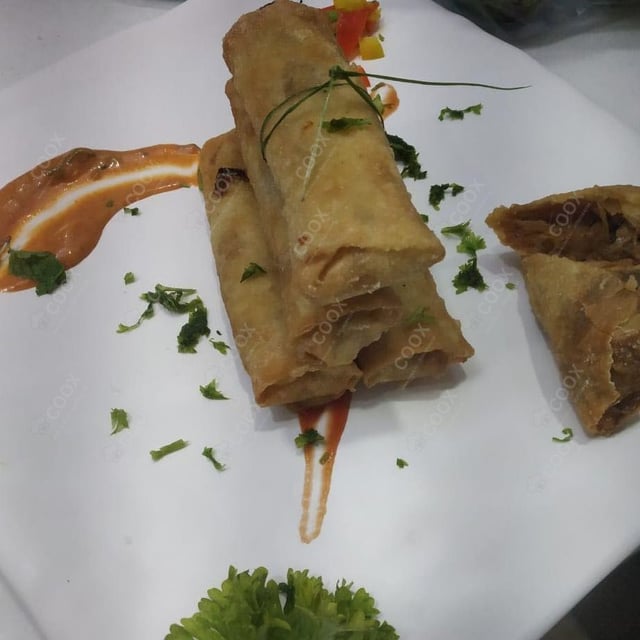 Delicious Veg Spring Rolls prepared by COOX