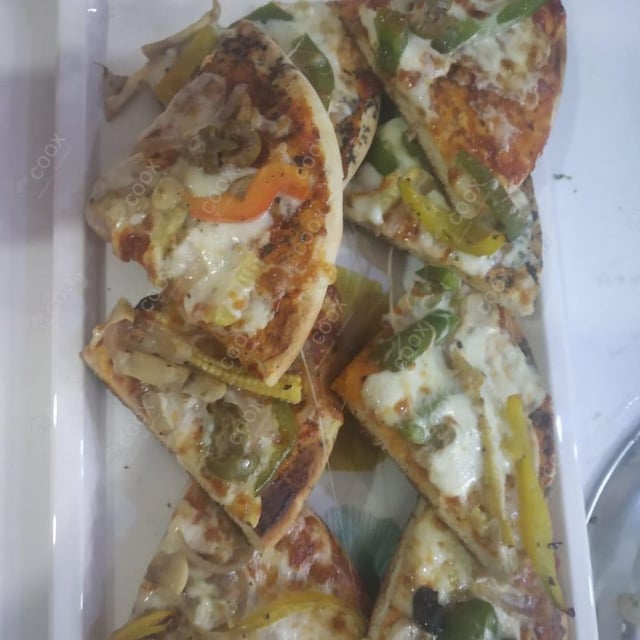 Delicious Classic Veggie Pizza prepared by COOX