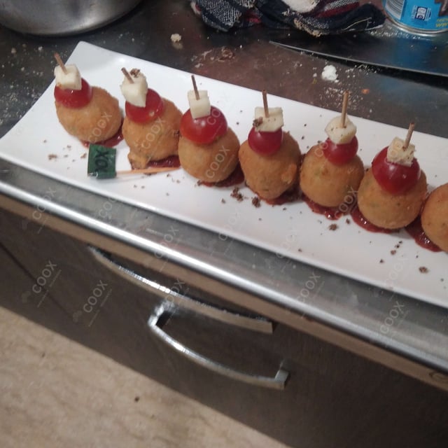 Delicious Fried Cheese Balls prepared by COOX