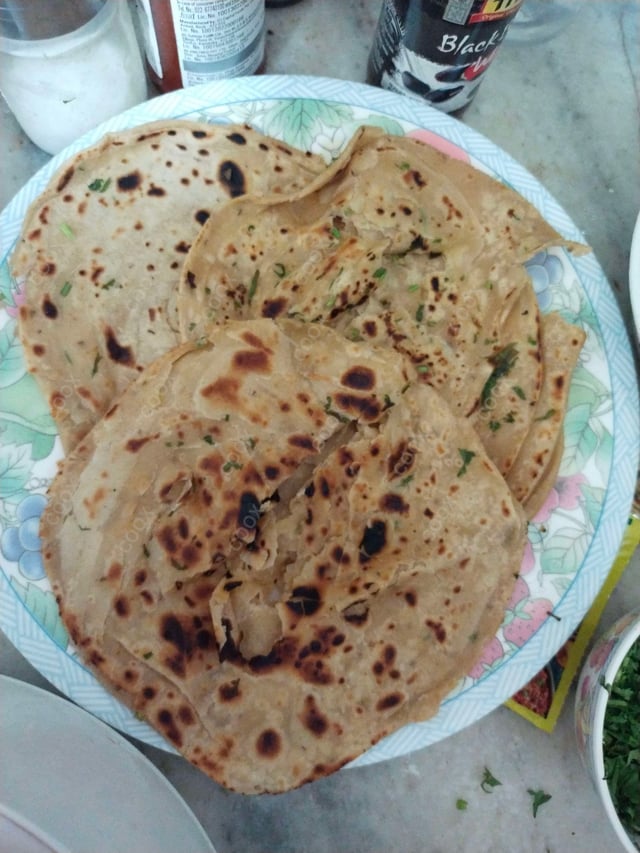 Delicious Lachha Parathas prepared by COOX