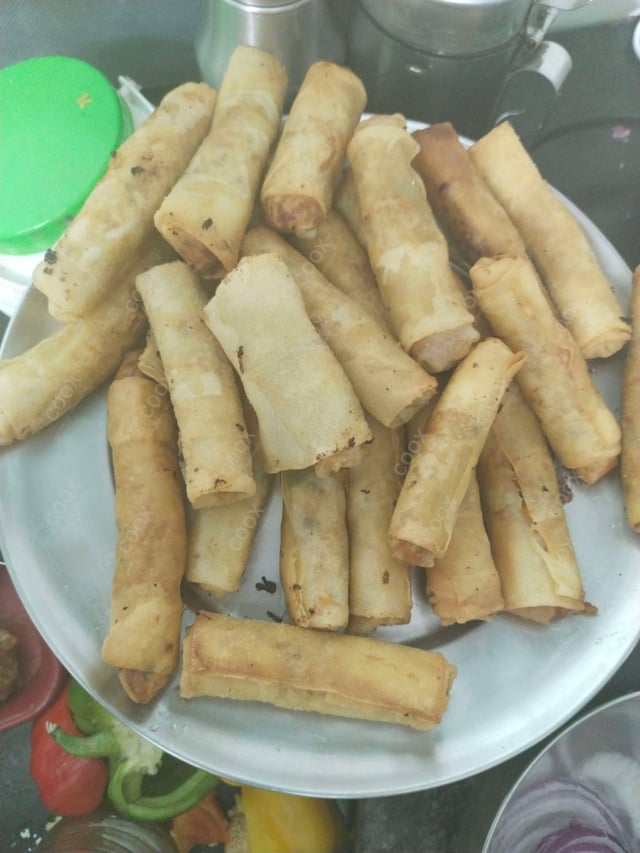 Delicious Veg Spring Rolls prepared by COOX