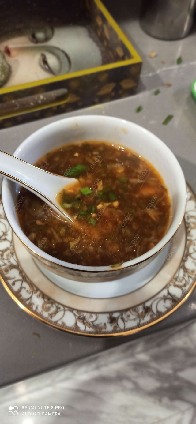 Delicious Vegetable Manchow Soup prepared by COOX