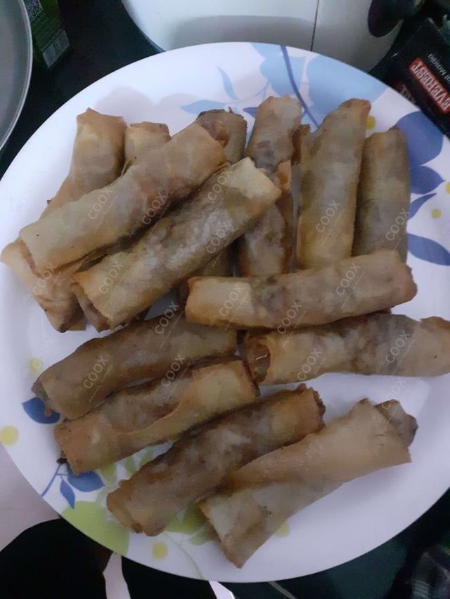 Delicious Veg Spring Rolls prepared by COOX