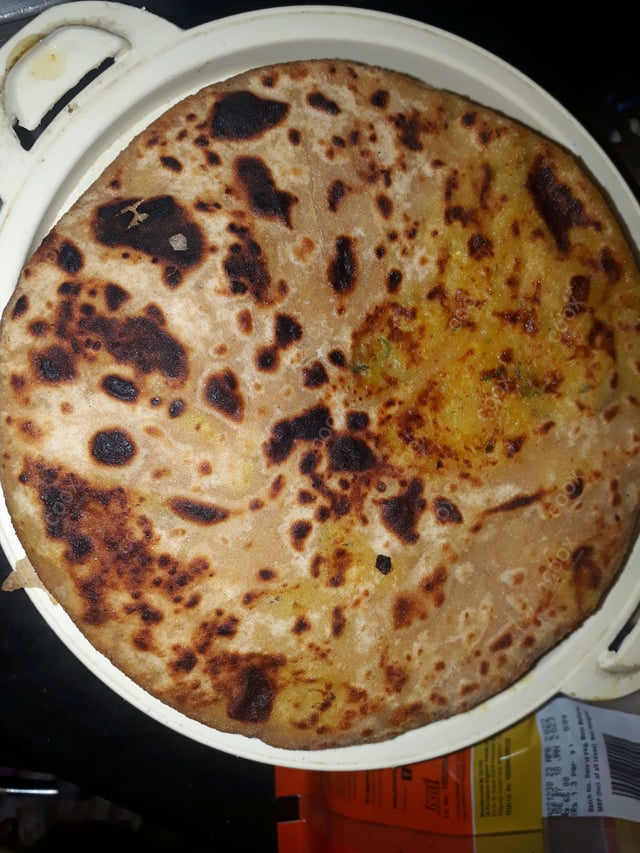 Delicious Stuffed Parathas prepared by COOX