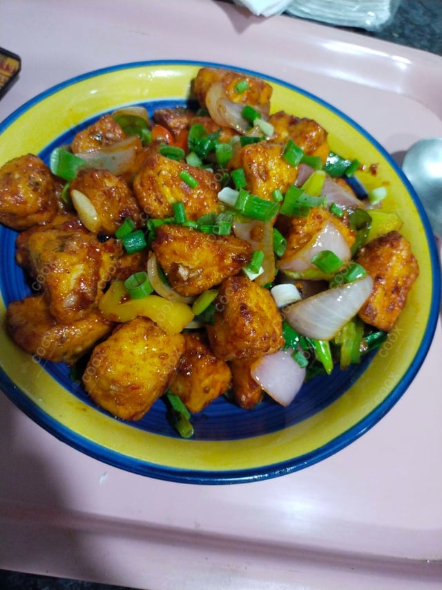 Delicious Chilli Paneer (Dry) prepared by COOX