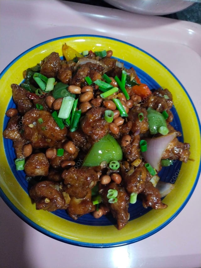 Delicious Kung Pao Chicken prepared by COOX