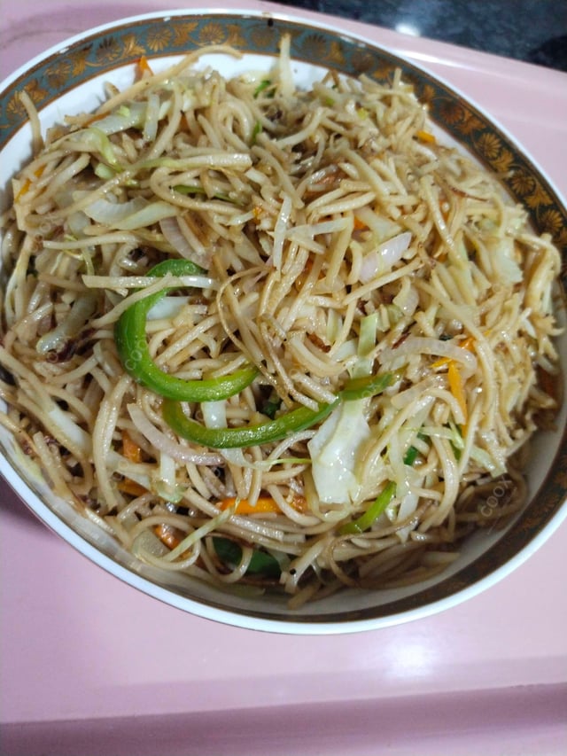 Delicious Veg Hakka Noodles prepared by COOX