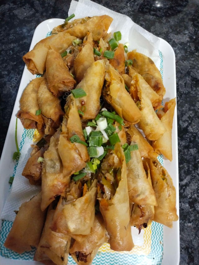 Delicious Veg Spring Rolls prepared by COOX