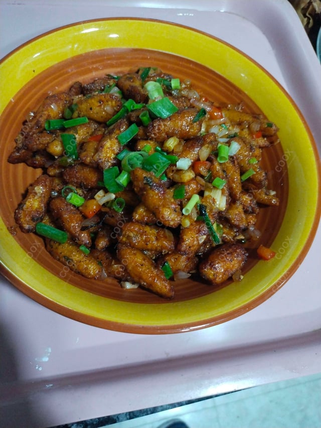 Delicious Crispy Chilli Baby Corn prepared by COOX