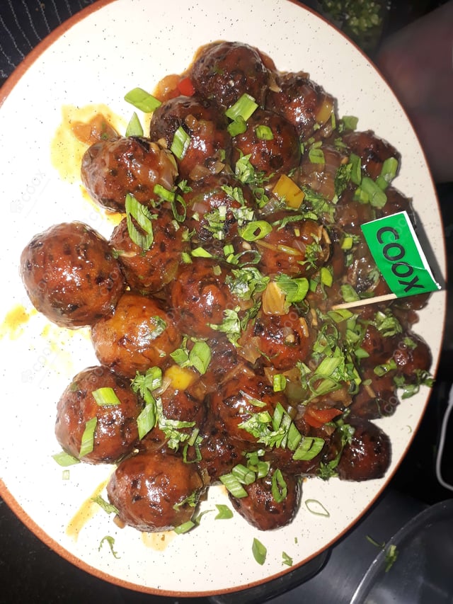 Delicious Veg Manchurian (Dry) prepared by COOX