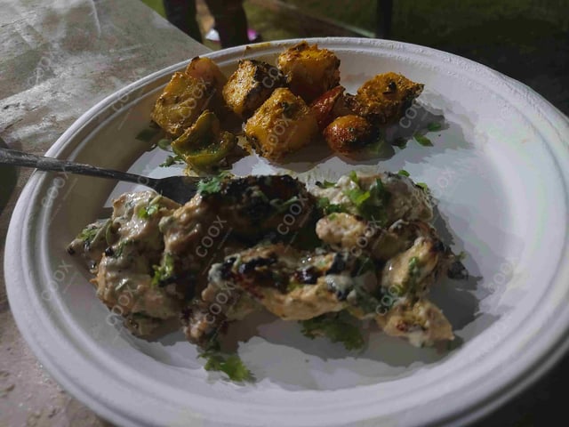 Delicious Murgh Malai Tikka prepared by COOX