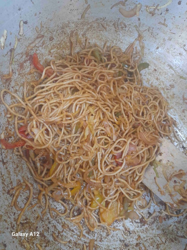 Delicious Veg Hakka Noodles prepared by COOX