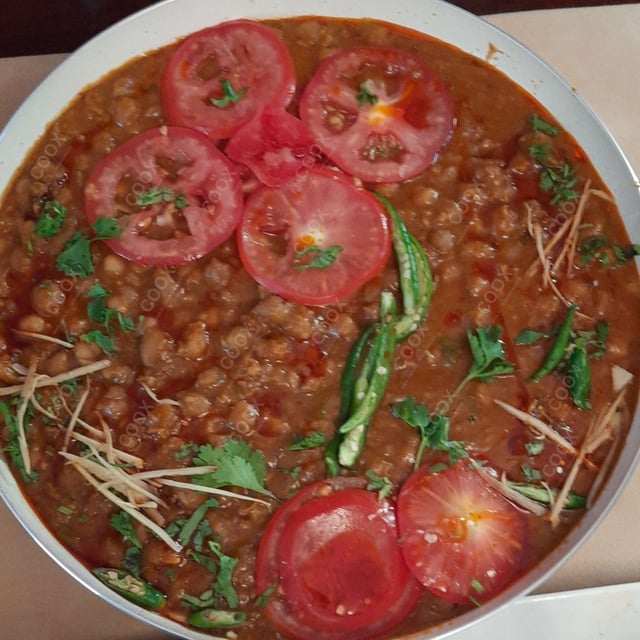 Delicious Chole Masala prepared by COOX