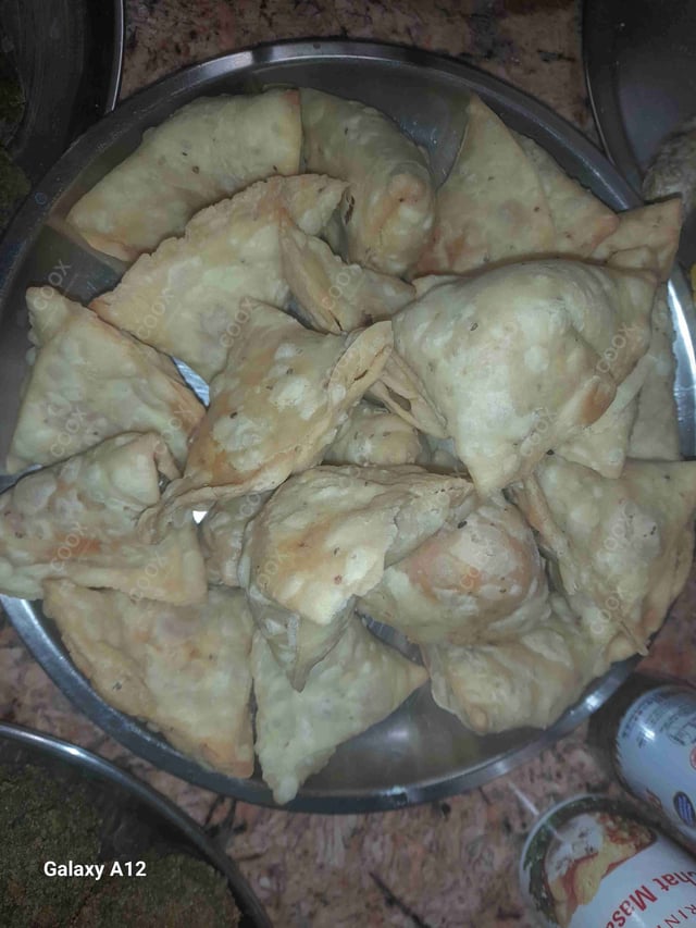 Delicious Mini Samosas prepared by COOX