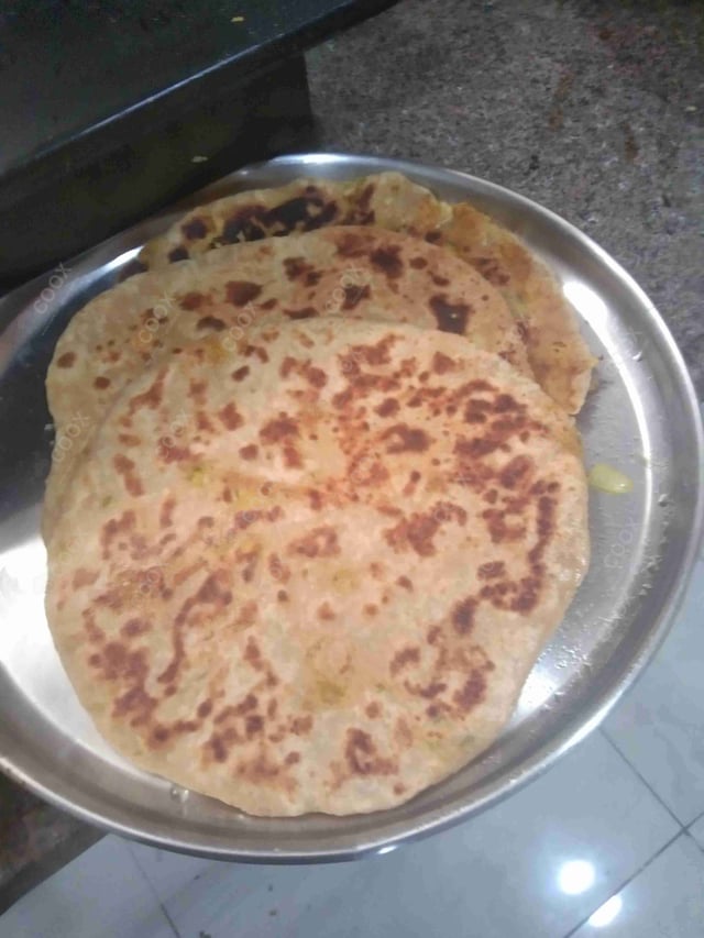 Delicious Stuffed Paranthas prepared by COOX