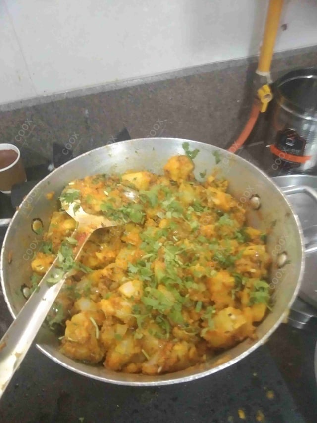 Delicious Jeera Aloo prepared by COOX