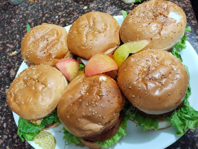 Delicious Mini Veg Burgers prepared by COOX