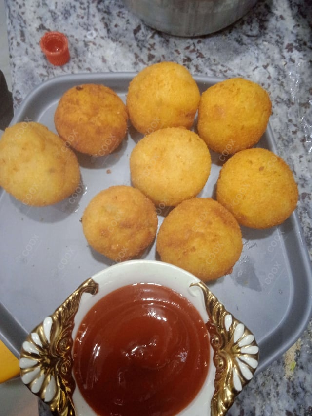 Delicious Fried Cheese Balls prepared by COOX