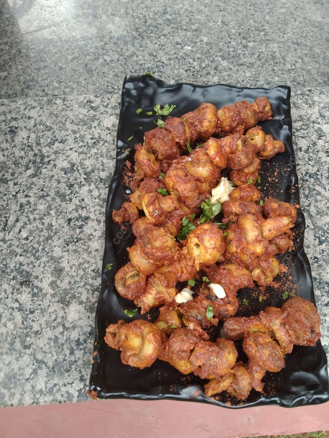 Delicious Mushroom Tikka prepared by COOX