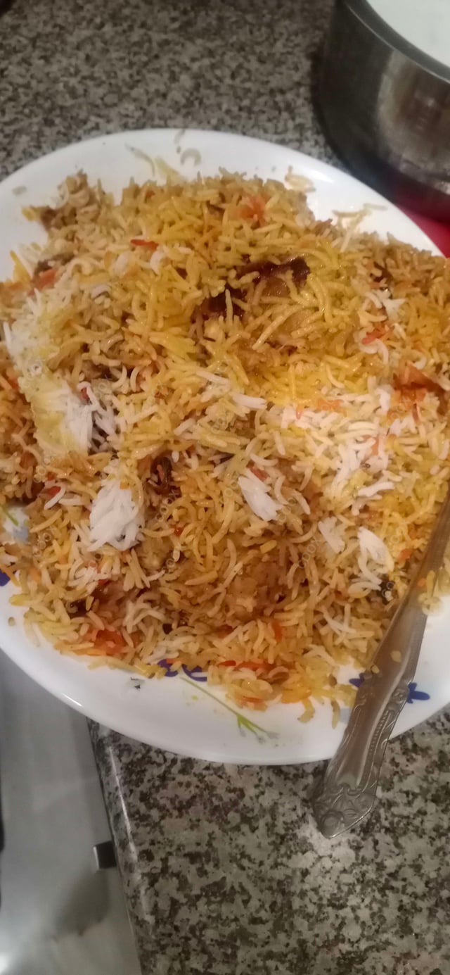 Delicious Chicken Biryani prepared by COOX