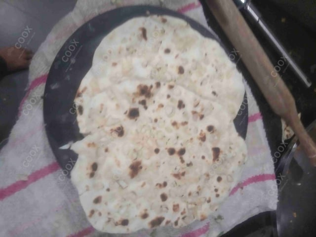 Delicious Naan (Butter / Garlic) prepared by COOX